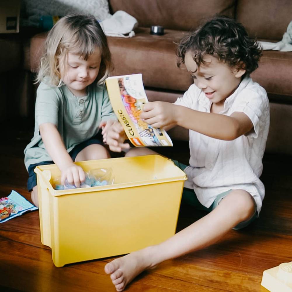 Children opening lego box